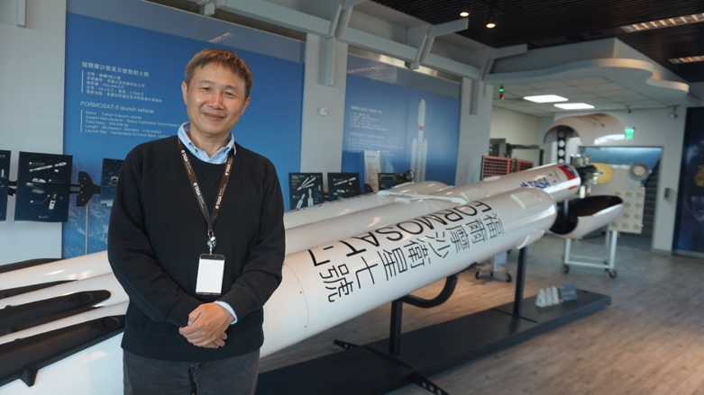 Picture 5: Dr. Chang with a Model of the Formosat-7 Falcon Heavy Rocket (Taken By Pei Lin-lin)